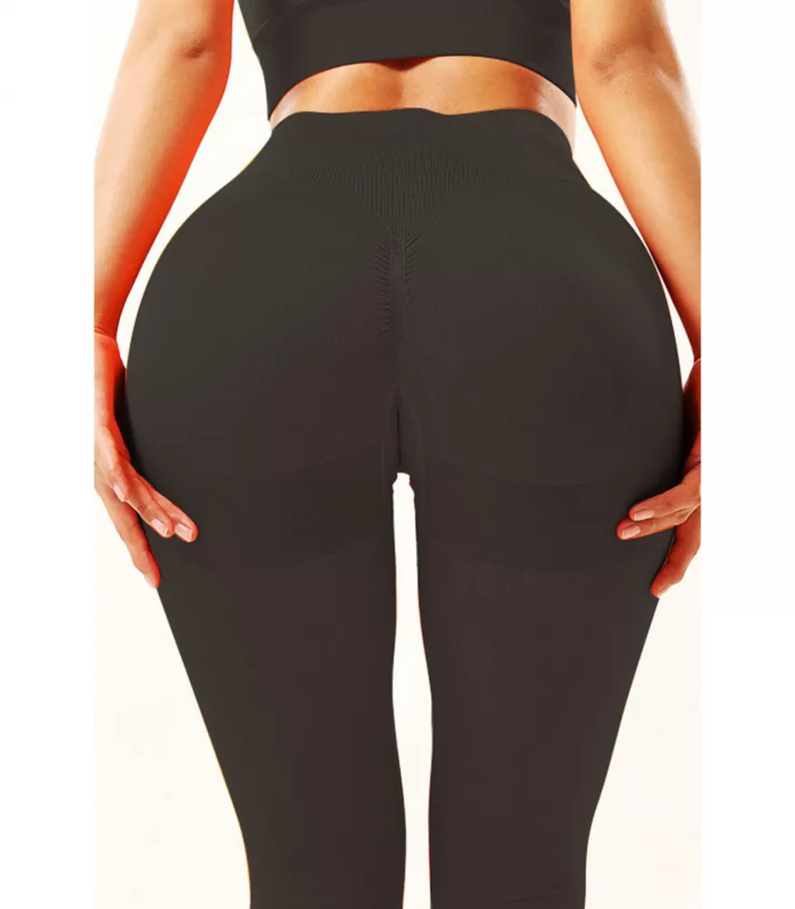 Black high-waisted push-up workout tights with accents
