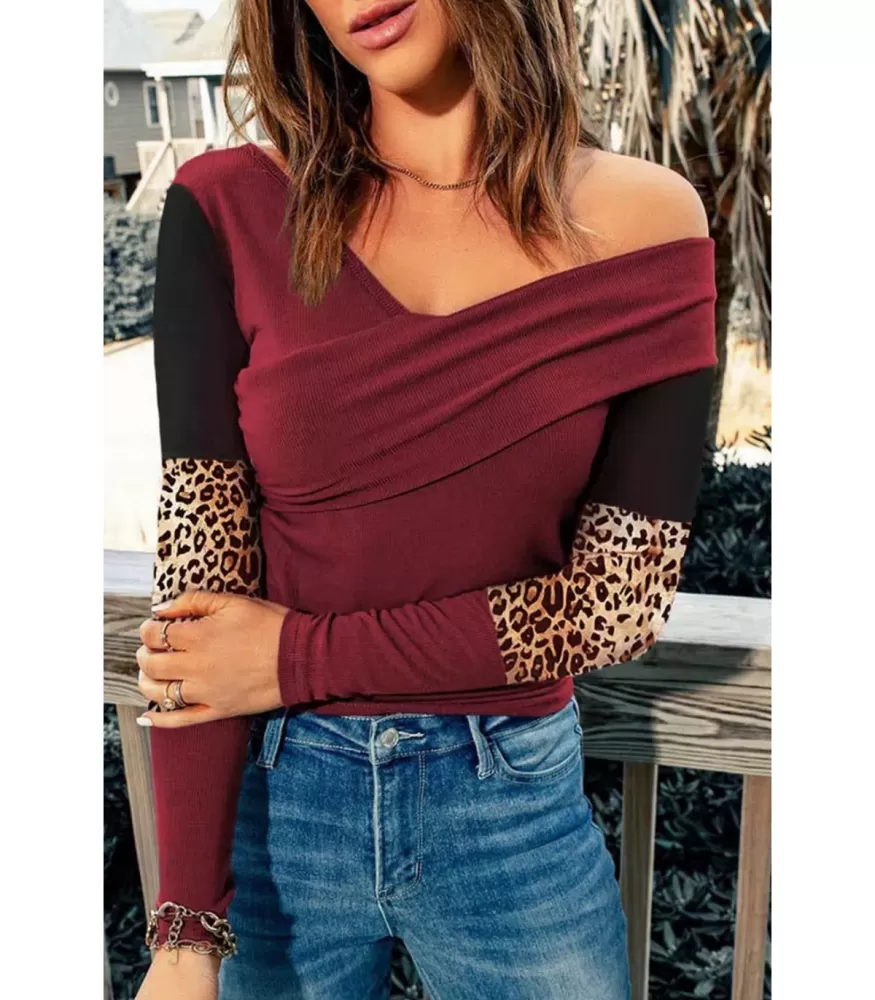 Red long-sleeved wrap look leo-decorated ribbed shirt