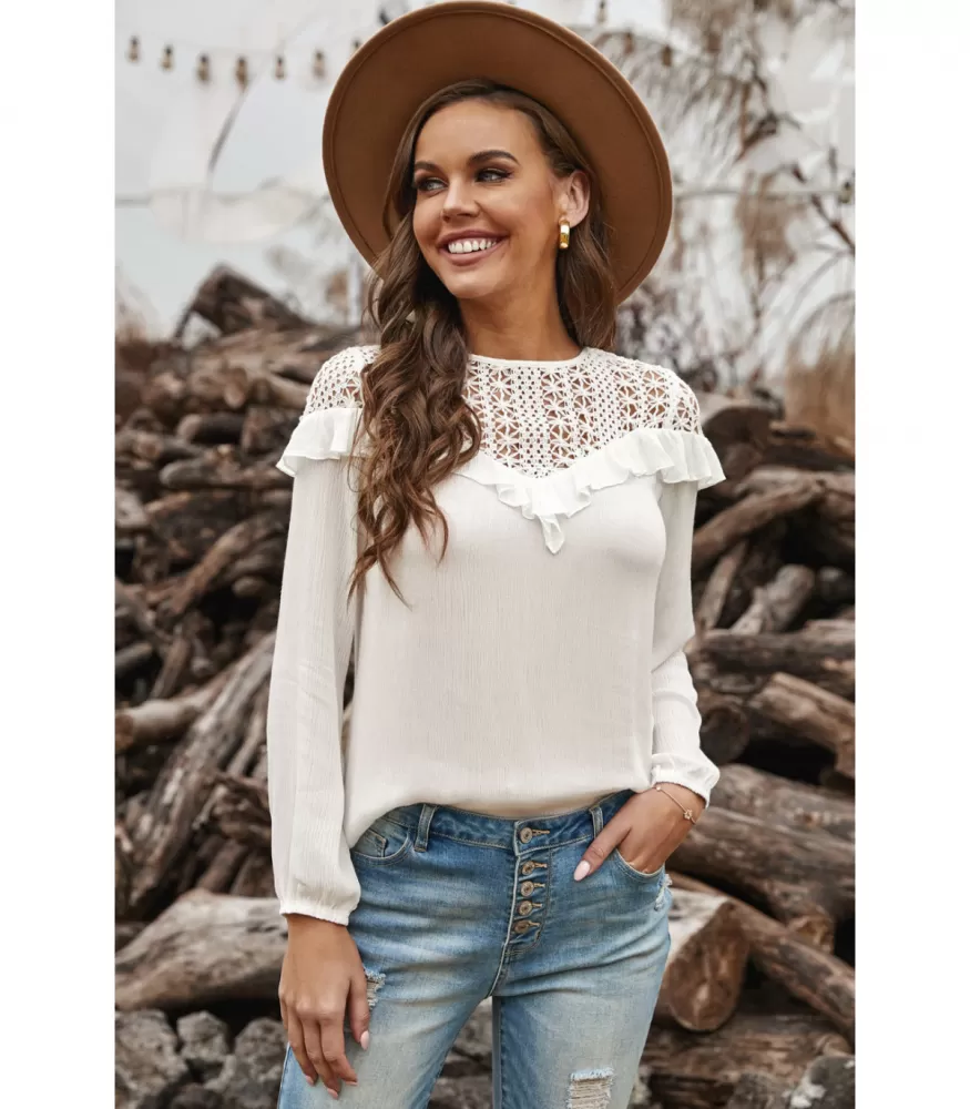 White ruffled decorative embroidered blouse